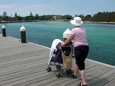 Megan and Grace walking along the river front